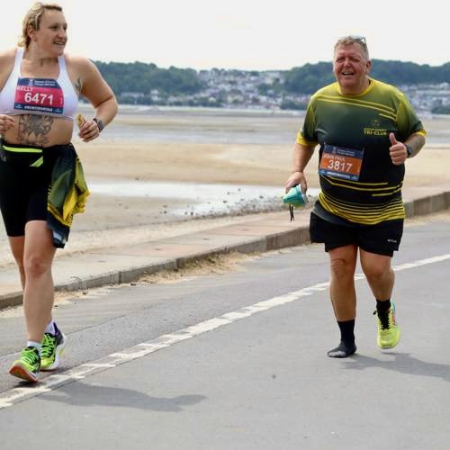 Running on the coastal path at Swansea Half Marathon