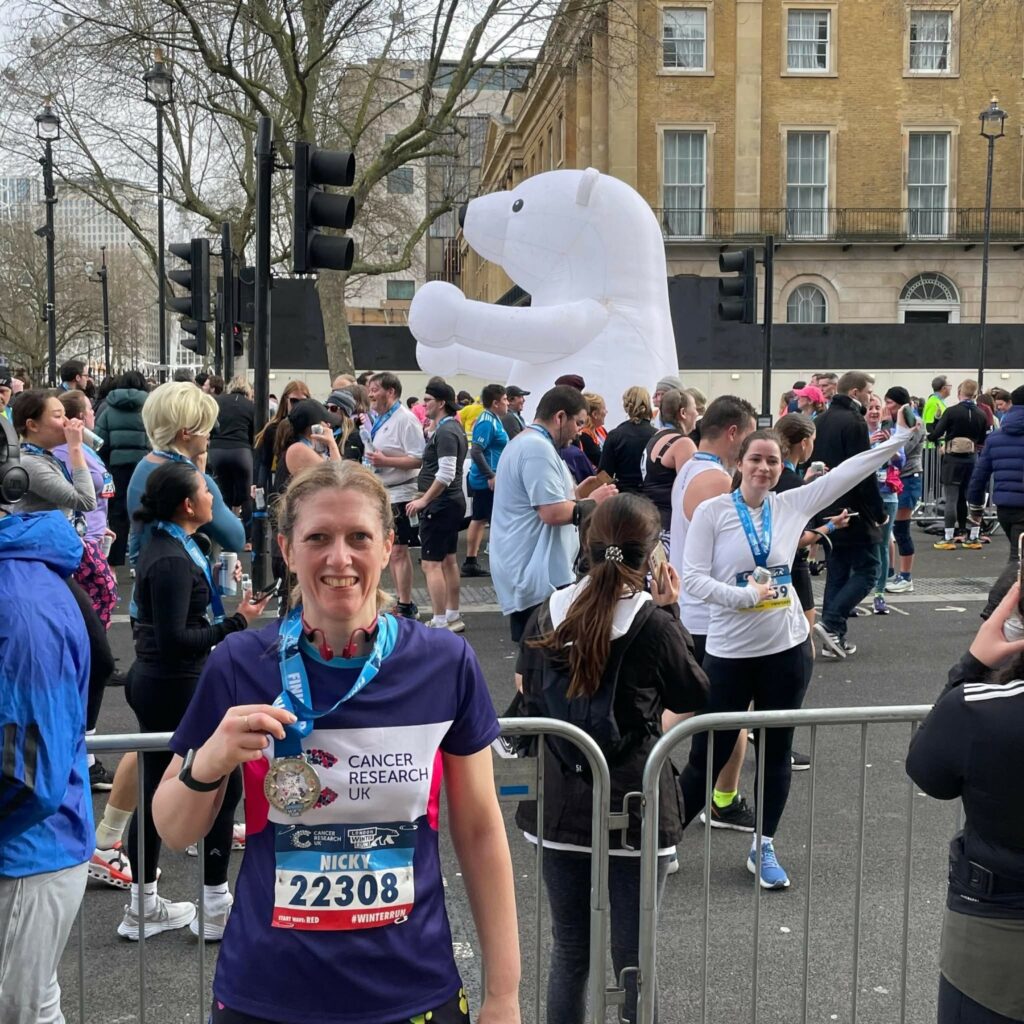 Nicky enjoying here achievement post-race. Stepping stone to the 2026 Great Welsh Marathon